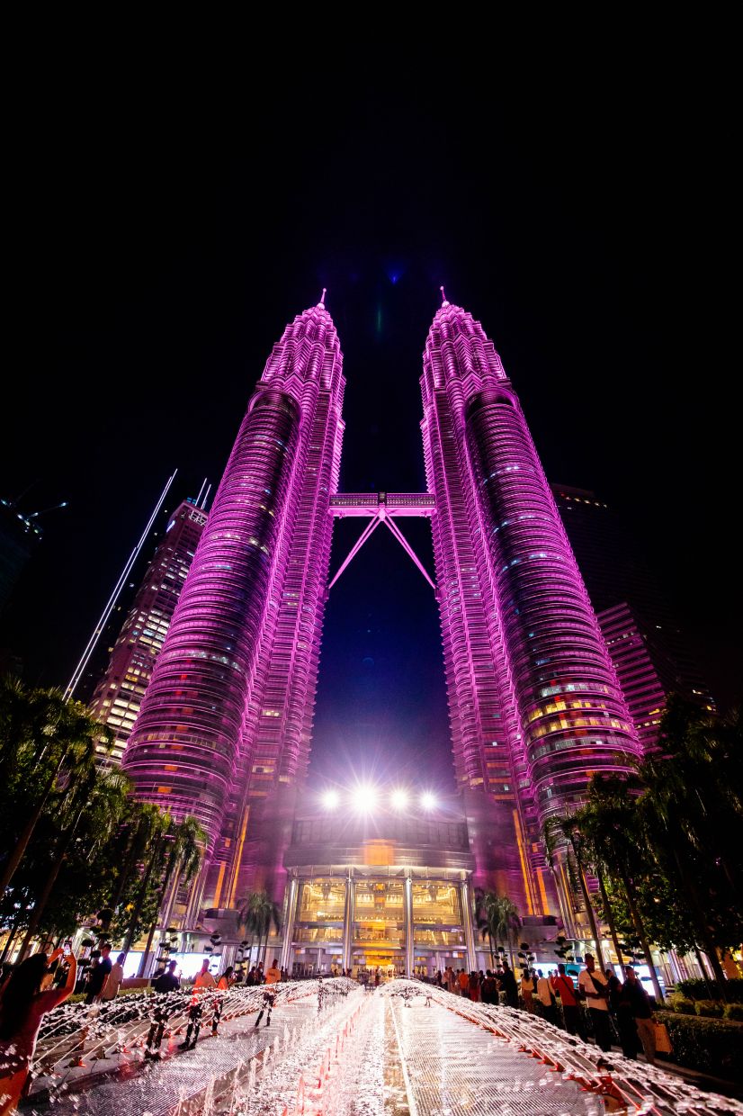 The beginning of Breast Cancer Awareness Month was marked with the illumination of the Petronas Twin Towers in pink. Photo: Estee Lauder