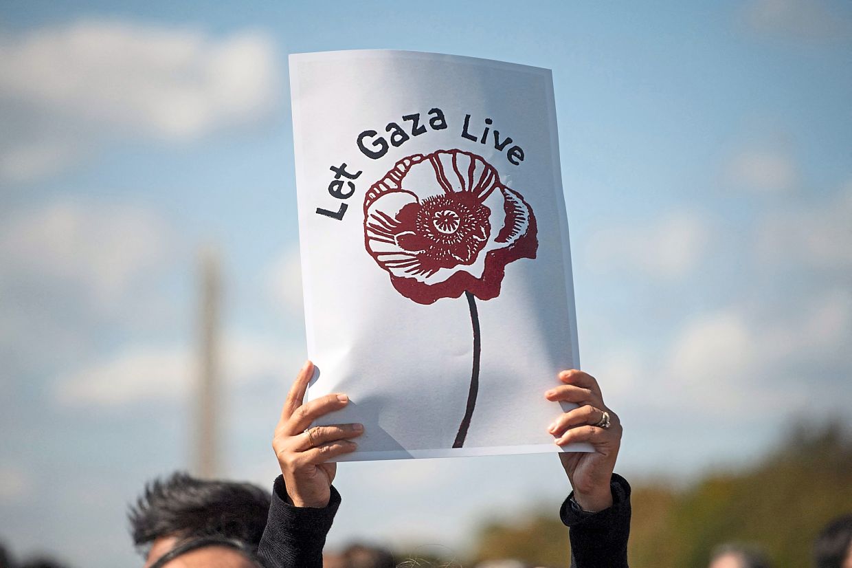 Tragically disappointing: Protesters rallying against the Israeli military operations in Gaza in Washington DC. Only the superpowers can pressure and stop Israel but the United States doesn’t seem to want to initiate a ceasefire or de-escalation. — AFP