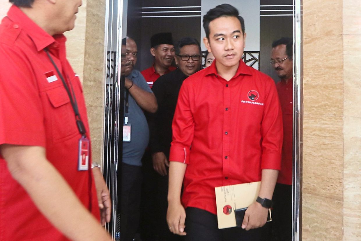 The Constitution Court's reent decision has cleared the way for Jokowi's eldest son Gibran (right) to join Parabowo's ticket in Indonesia's presidential race. — The Jakarta Post/Asia News Network
