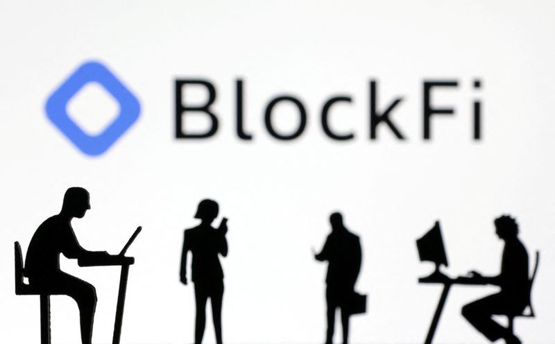 FILE PHOTO Figurines with smartphones and computers are seen in front of the BlockFi logo in this illustration November 28 2022. REUTERSDado RuvicIllustrationFile Photo