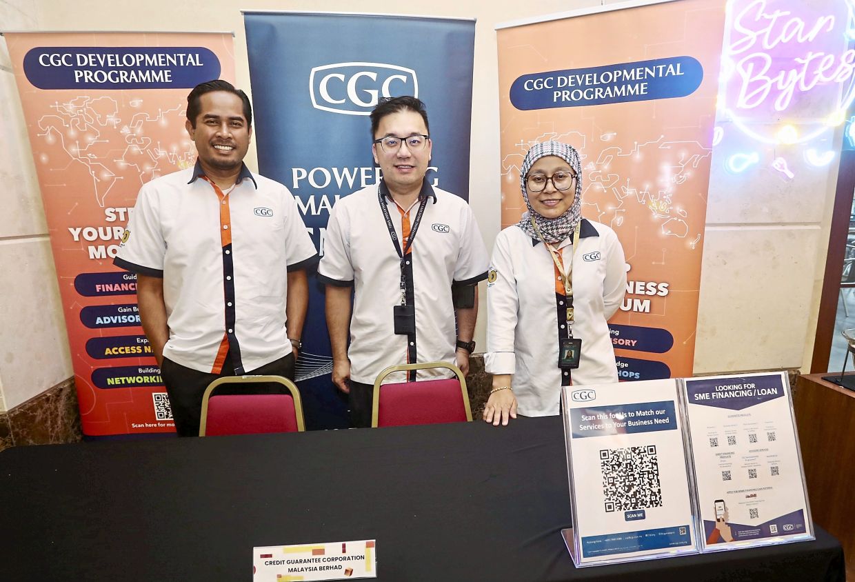 The team from Credit Guarantee Corporation Malaysia offering financial advice and development schemes and programmes to SMEs, to help their businesses.