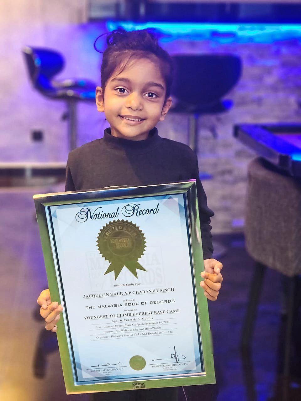Inspirational: Jacqueline Kaur posing with her certificate. — Photo courtesy of Melinder Kaur