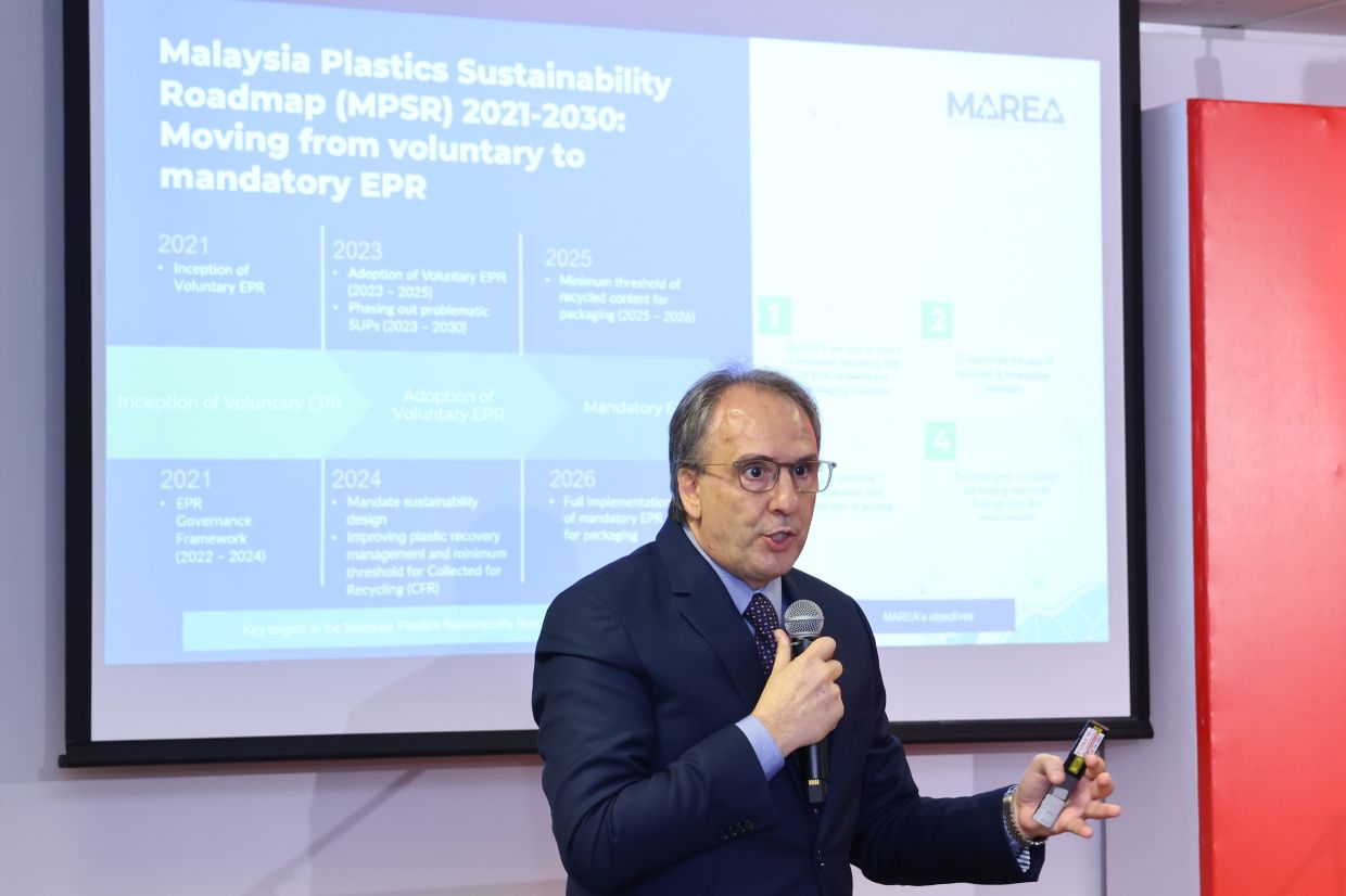 Roberto Benetello participating in an engaging panel discussion on extended producer responsibility the topic of circular economy with members of aMCHaM Malaysia and the media.