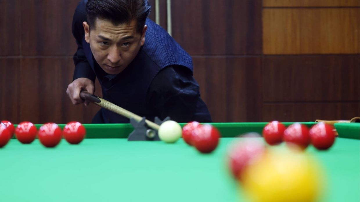 Hong Kong's only disabled snooker player Andy Lam defies hypoxia to win tournaments single-handed - Vimarsana News