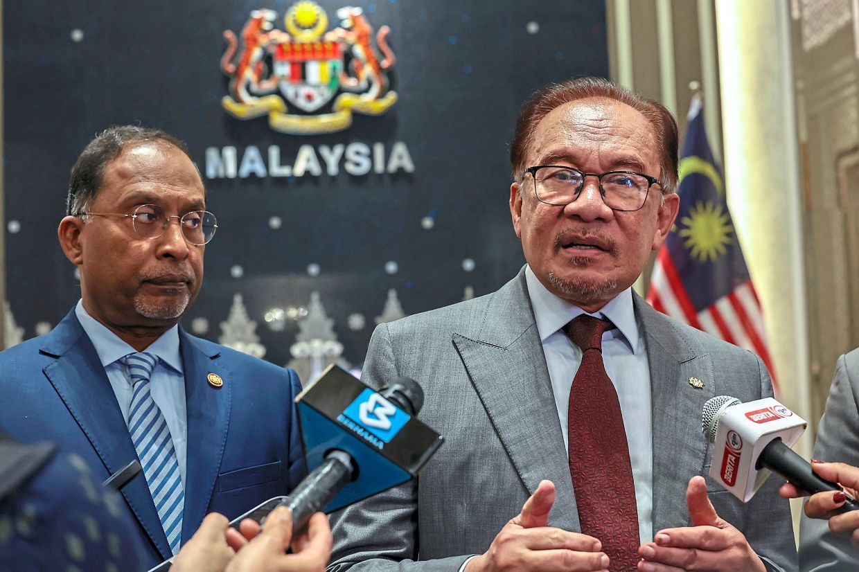 In solidarity: Anwar (right), here seen with Zambry at a press conference in Seri Perdana, has piqued the interest of many in the past weeks since he came back from a tour of several West Asian countries on a diplomatic push for countries to do something to stop the attack by Israel in Gaza, which has killed thousands since it began early last month. — Bernama