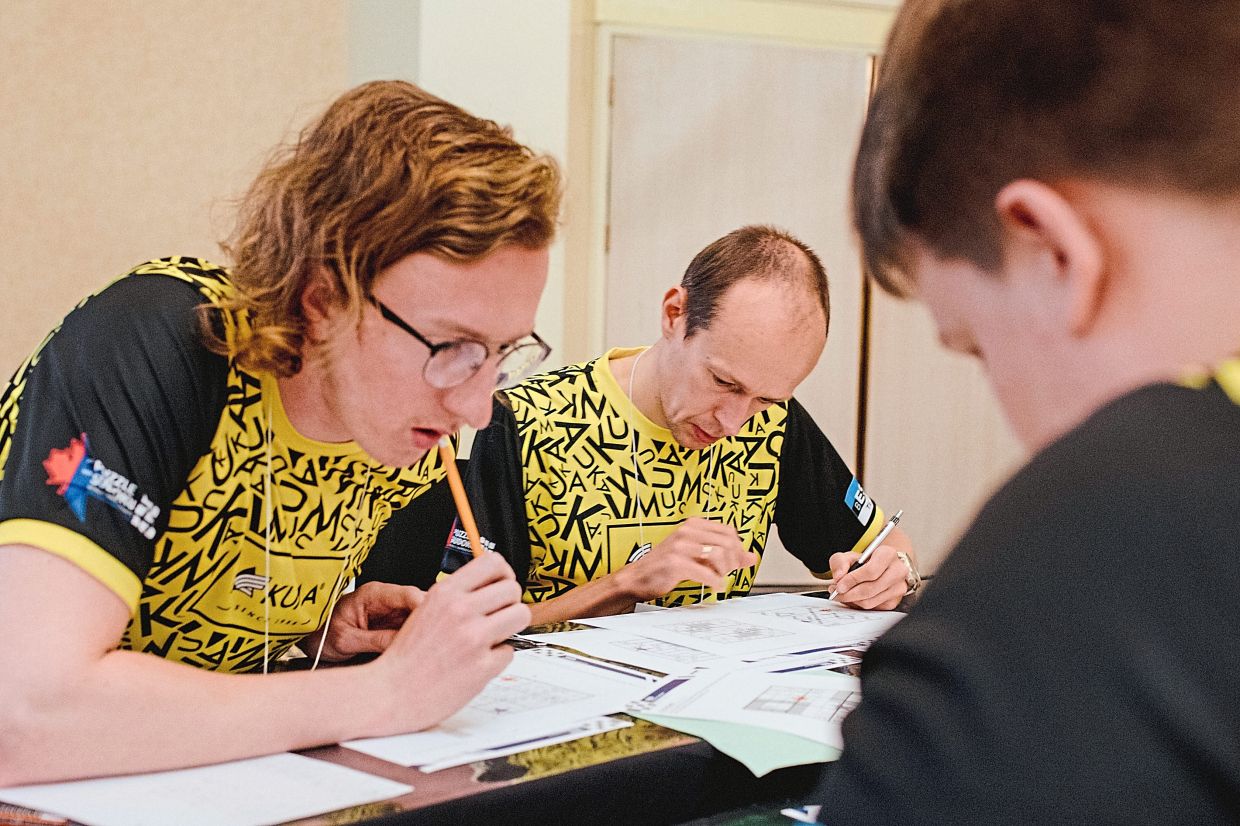 Vunk (centre) during the Sudoku team competition at the World Sudoku and Puzzle Championships in Toronto. — ©2023 The New York Times Company