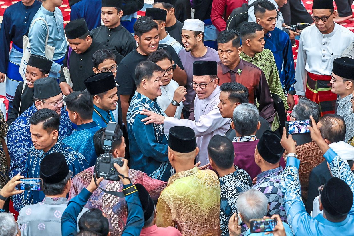 Important milestone: Anwar greeting colleagues and supporters at a thanksgiving ceremony in Putrajaya to celebrate the one year anniversary of Anwar’s leadership as the country’s 10th Prime Minister and his Malaysia Madani concept. — Bernama