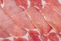 Sichuan residents salty over bacon smoking ban