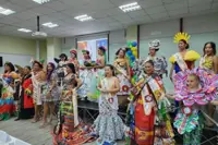 Filipino maids model works of couture art created from household rubbish