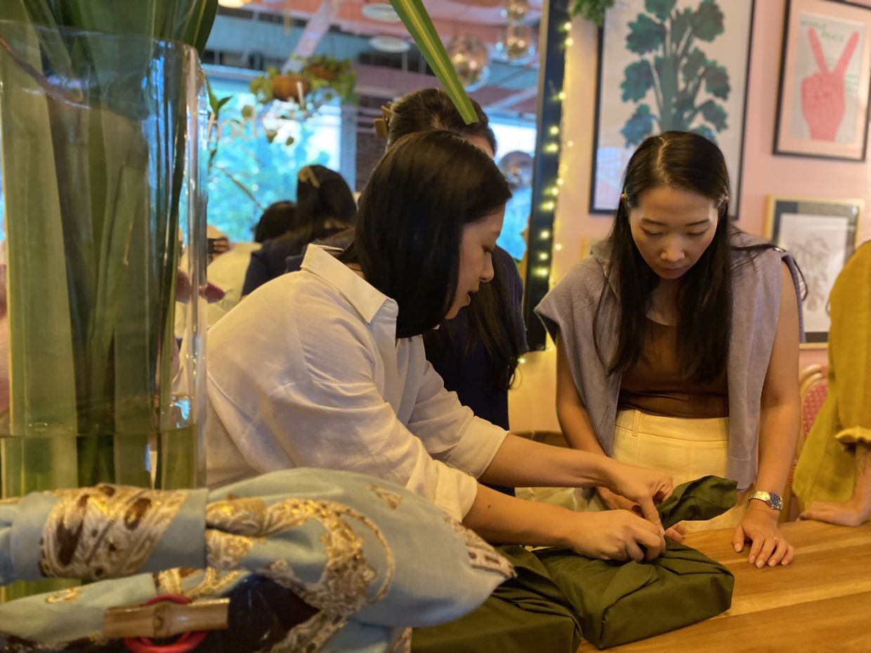 The 'Dia Guild x Talee Studio' giftwrapping workshop saw participants learning how be more sustainable by using eco-friendly materials such as cloth and hand-tied tassels. Photo: Dia Guild