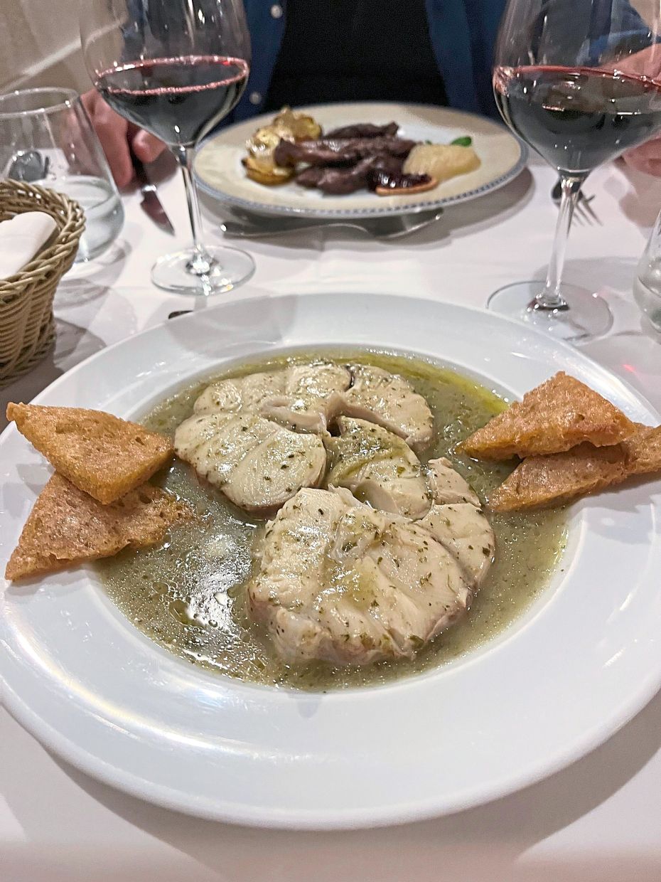 At Evora, try this traditional Alentejan dishes called 'dogfish in coriander sauce'.