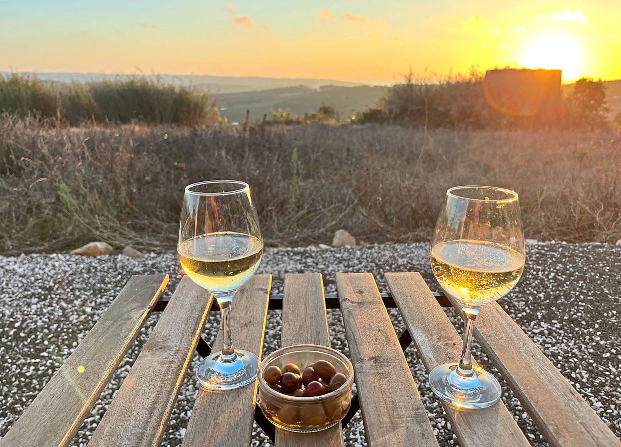Have some glasses of Vinho Verde and local olives in the hills above Lourinha.