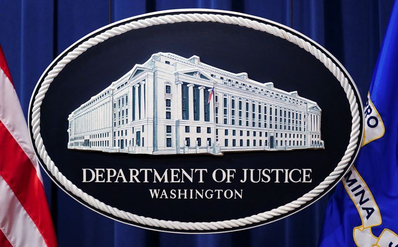 A U.S. Justice Department logo or seal showing Justice Department headquarters known as quotMain Justicequot is seen behind the podium in the Departments headquarters briefing room before a news conference with the Attorney General in Washington January 24 2023.  REUTERSKevin LamarqueFile Photo