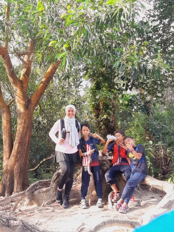 (From left) Siti Munirah, Ahmad Fahim, Ahmad Luthfi and Ahmad Khamel, during one of their weekend hikes in the Klang Valley.