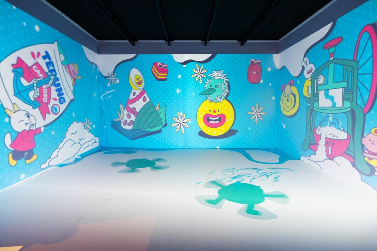 ‘Monkiddo’s Christmas Stories’ by Lim Jayee illustrates a whimsical world where a diverse crew of monsters throw a Christmas bash, featuring Malaysia’s delectable food scene and the heartwarming spirit of the season.