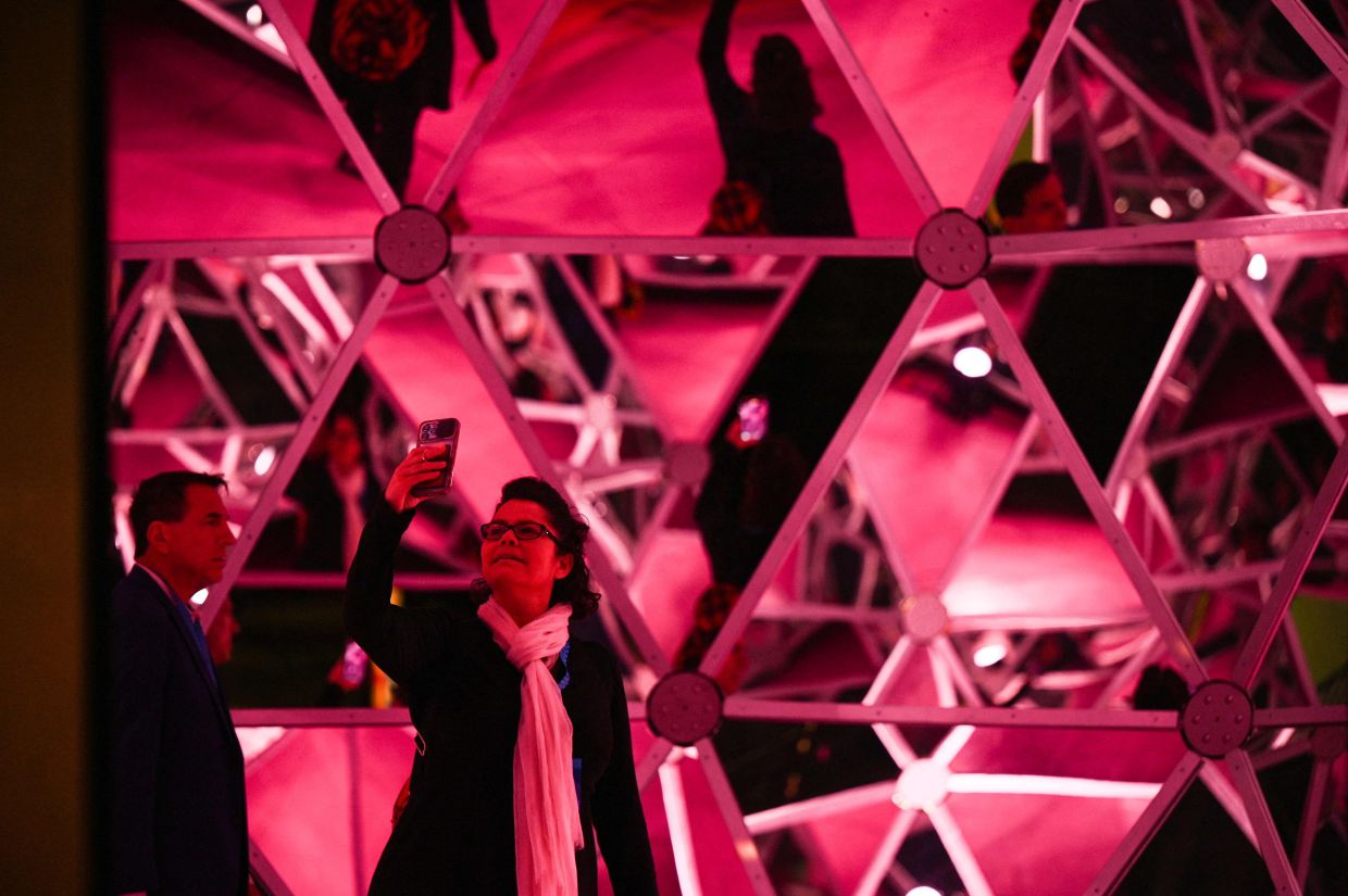 Visitors experience the 'Dalidom' by Salvador Dali, at Luna Luna: Forgotten Fantasy in Los Angeles. Photo: AFP