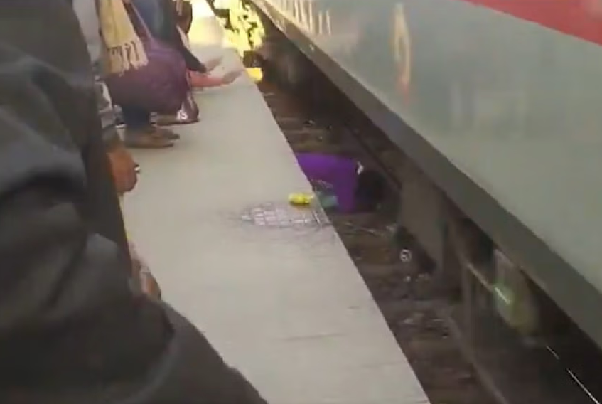 Woman in India saves her two kids as train went over them | The Star