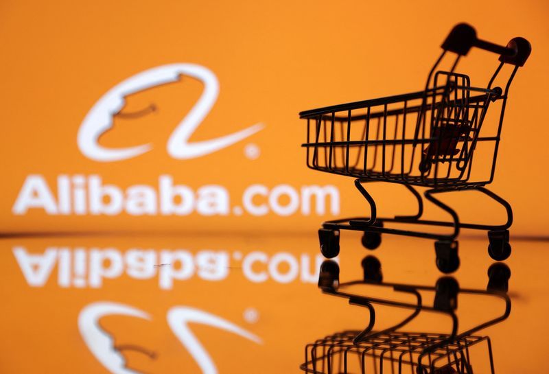 FILE PHOTO Shopping trolley is seen in front of Alibaba logo in this illustration July 24 2022. REUTERSDado RuvicIllustrationFile Photo