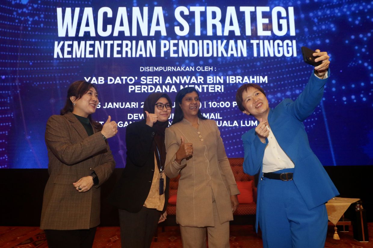 (from right) Dr Jenny Wong Sook Khuan from Saito University College takes a wefie with Nitia Samuel from Academy of Sciences Malaysia, Farha Husna Ramli from Academy of Sciences Malaysia and Prof Madya Ts Dr Jessica Ong Hai Liaw from Universiti Pertahanan Nasional Malaysia in conjunction with the Higher Education Ministry Strategic Discourse launch by Prime Minister Datuk Seri Anwar Ibrahim at the World Trade Centre in Kuala Lumpur. — FAIHAN GHANI/The Star