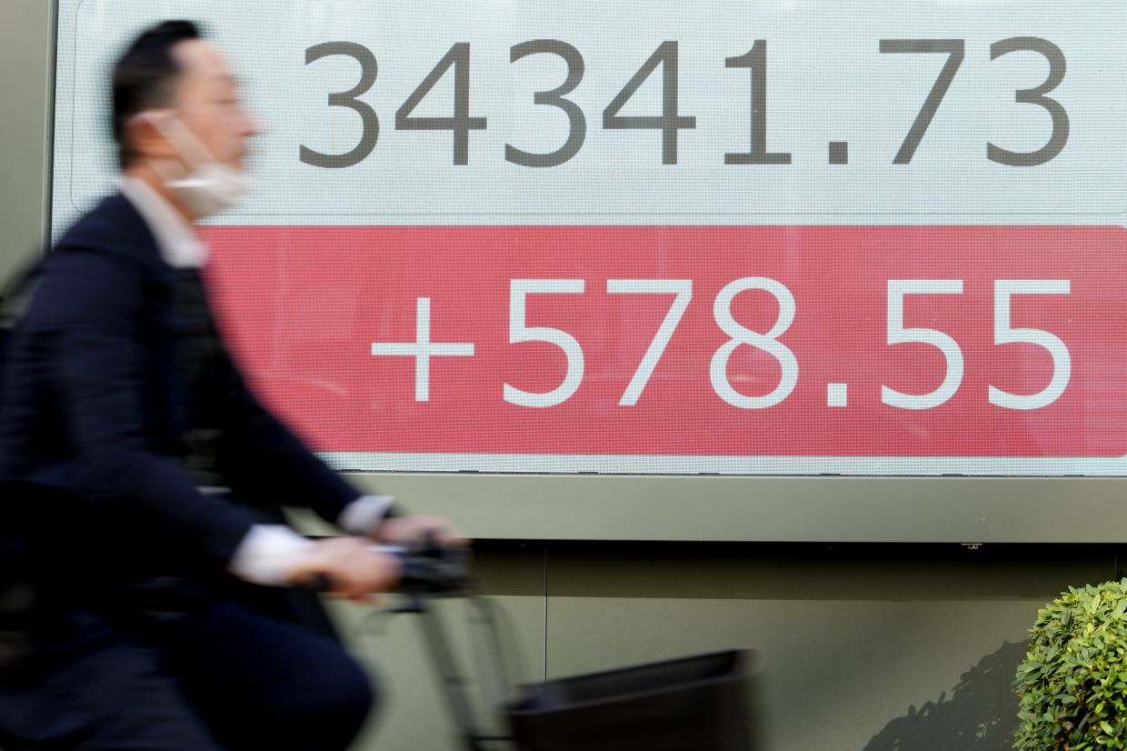 Asian markets track Wall St gains ahead of key inflation data | The Star