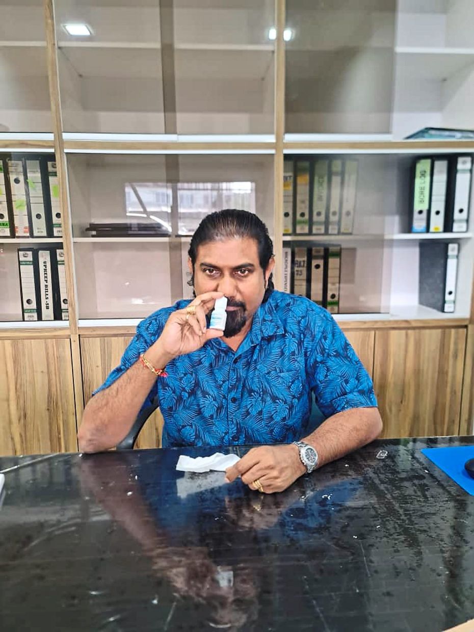 Nagarajan uses a nasal spray to flush his nose whenever necessary. — S. NAGARAJAN