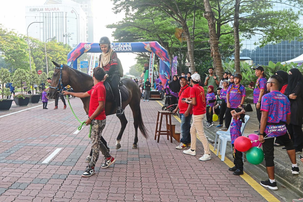 Visitors enjoying horse rides at the event.