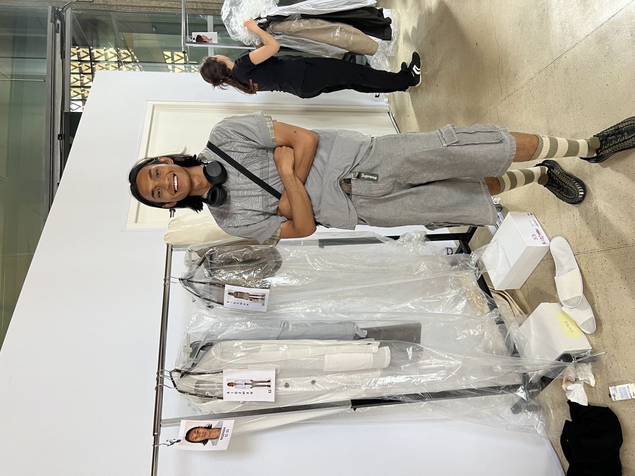 The young man has been booking shows with the biggest fashion houses. He is shown here backstage at the Hermes Spring/Summer 2024 runway presentation at Paris Fashion Week. Photo: Ridzman Zidaine