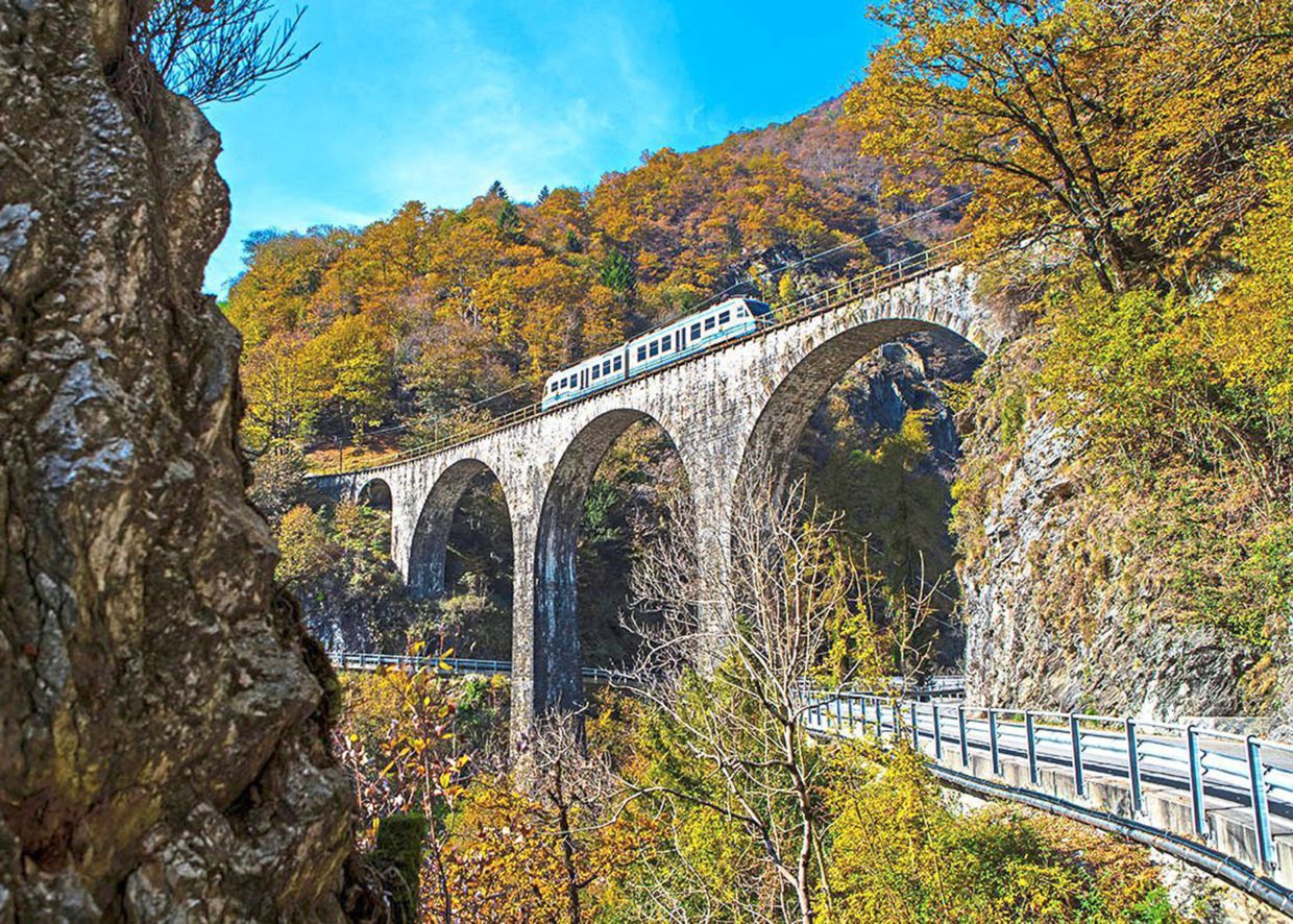 A highlight of the rail journey is crossing high stone bridges