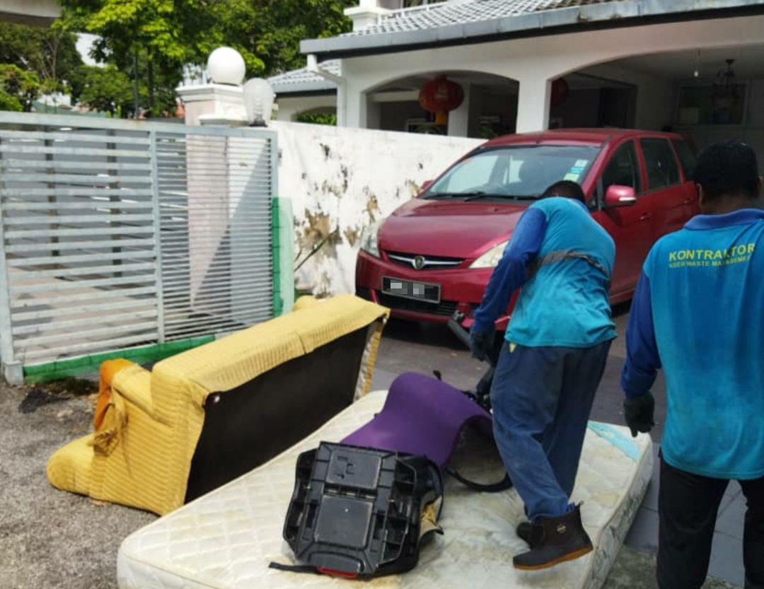 KDEB Waste Management workers collecting bulk waste from a home in Subang Jaya.