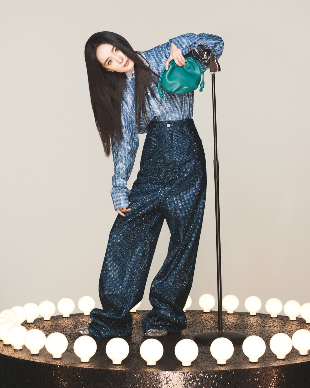 Renowned actress Yang Mi stars in a campaign dedicated to the intricate craft and colours of Chinese jade sculpture. Photo: Loewe