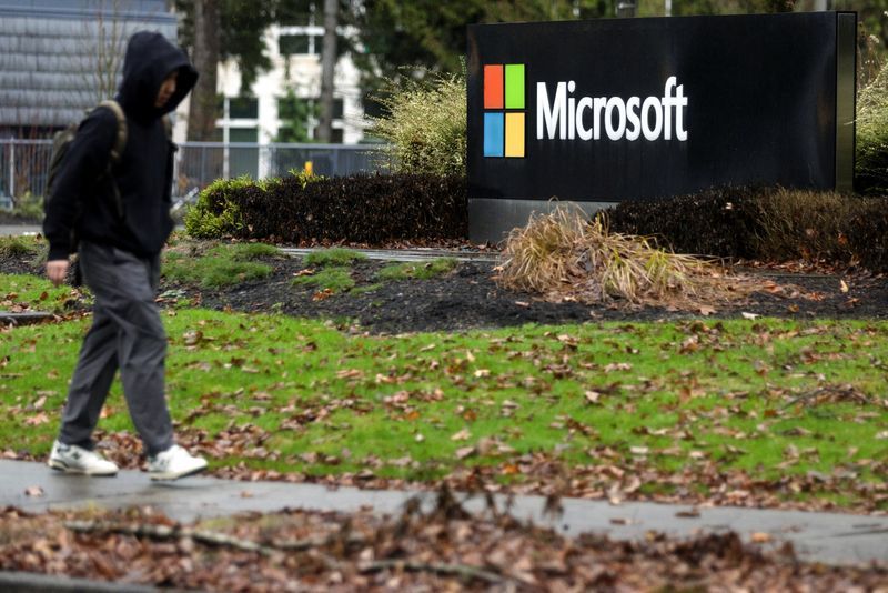A person walks past Microsoft signage at the headquarters in Redmond Washington U.S. January 18 2023. REUTERSMatt Mills McKnightFile Photo