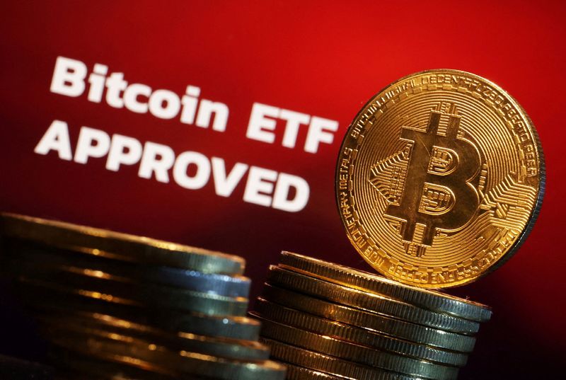 FILE PHOTO Representation of Bitcoin cryptocurrency and quotBitcoin ETF Approvedquot words are seen in this illustration taken January 11 2024. REUTERSDado RuvicIllustrationFile Photo