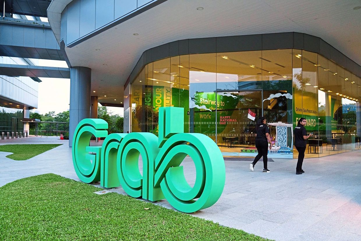 Grab, GoTo revive talks for mega ride-hailing merger, say sources