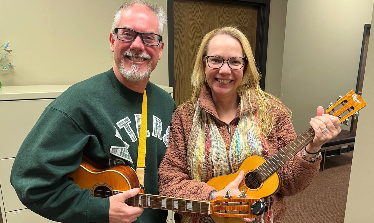Lilly (left) and Snow, now married, met after joining a Naperville ukulele group, which gathers to play once a weekly and performs publicly. — JEFF VORVA/Chicago Tribune/TNS