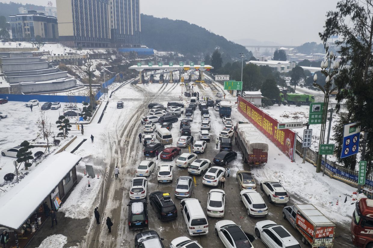 Long charging lines, snow stymie EV drivers in China New Year - Vimarsana News