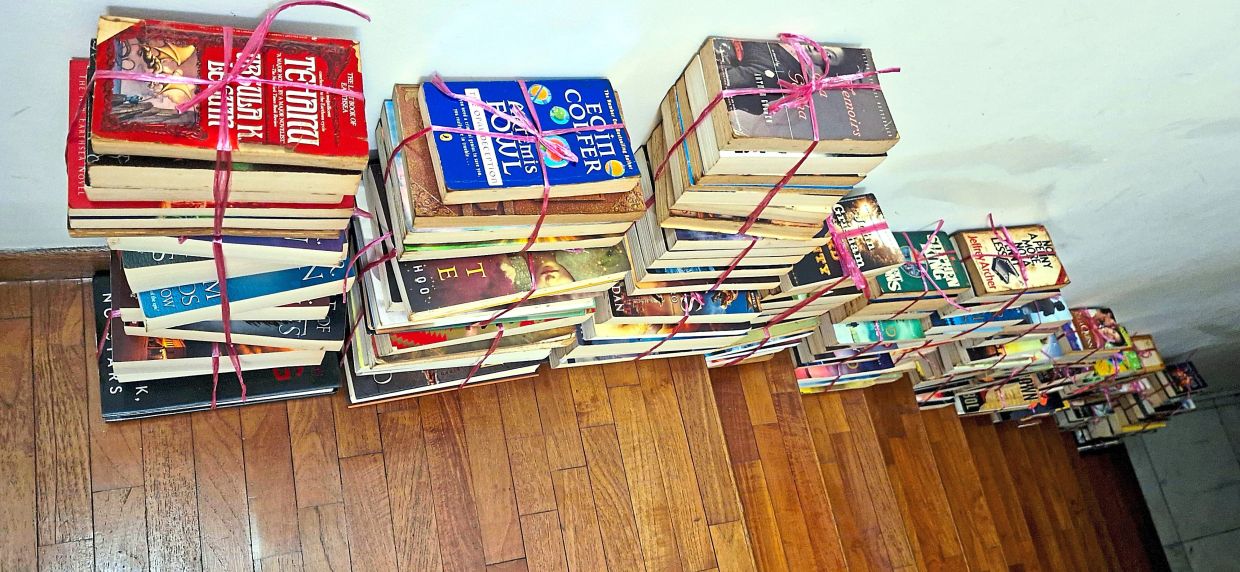 Treasure trove of knowledge: Time and humidity taking a toll on the physical condition of books as they turn brown and unglued.