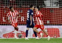 Soccer-Romero scores twice as bottom side Almeria hold Atletico to a draw
