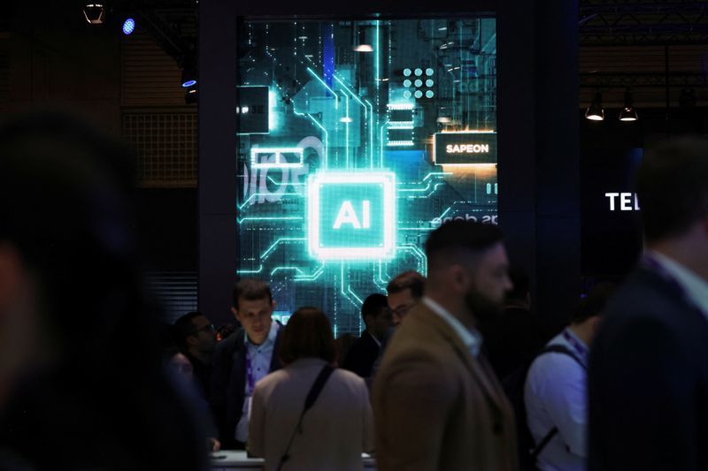 People walk near a sign for Sapeon an artificial intelligence AI chip company at the Mobile World Congress MWC in Barcelona Spain February 27 2024. REUTERSBruna Casas
