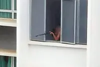 Teen held over sniper-like photo on social media