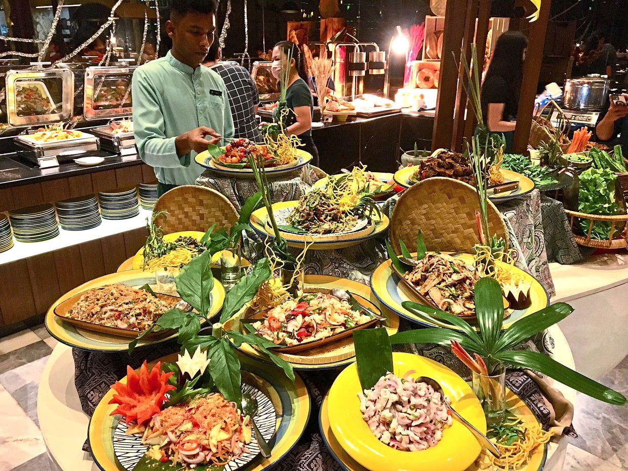 A wide selection of kerabu to savour at Sedap restaurant at Pullman Kuala Lumpur City Centre Hotel and Residences. — Photos: KAMARUL ARIFFIN/The Star