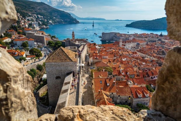 Explore Croatia's fortified towns, stunning coastlines and national parks with Trafalgar's Balkan Delight tour.