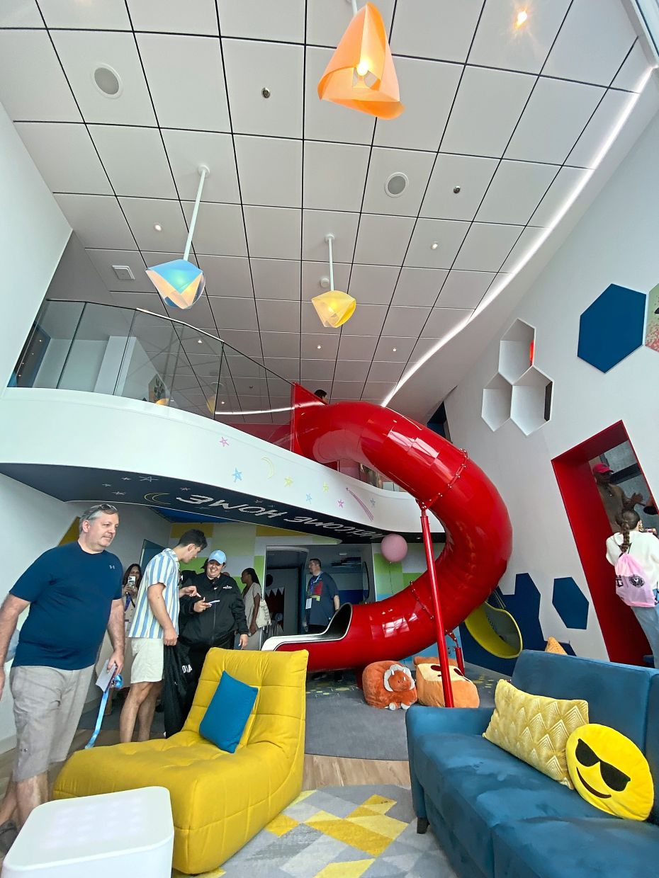 The Ultimate Family Townhouse is a threefloor suite that has an indoor slide among others