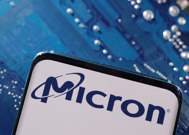 FILE PHOTO A smartphone with a displayed Micron logo is placed on a computer motherboard in this illustration taken March 6 2023. REUTERSDado RuvicIllustrationFile Photo
