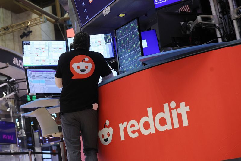 A trader wears a t-shirt with Reddits logo at the New York Stock Exchange NYSE in New York City U.S. March 21 2024. REUTERSBrendan McDermid