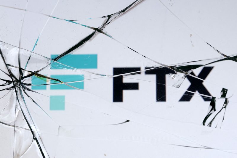FILE PHOTO An FTX logo is seen through broken glass in this illustration taken December 13 2022 REUTERSDado RuvicIllustrationFile Photo