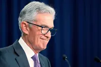 Powell says balance sheet drawdown taper coming soon