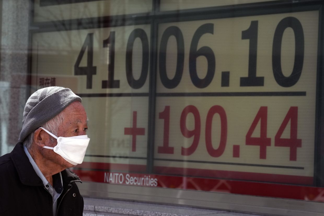 Asian markets mixed as key US inflation data looms | The Star