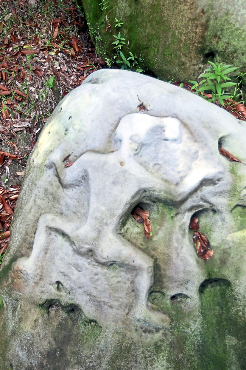 This Batu Gambar sculpture was discovered in Sungai Jaong by Harrison
