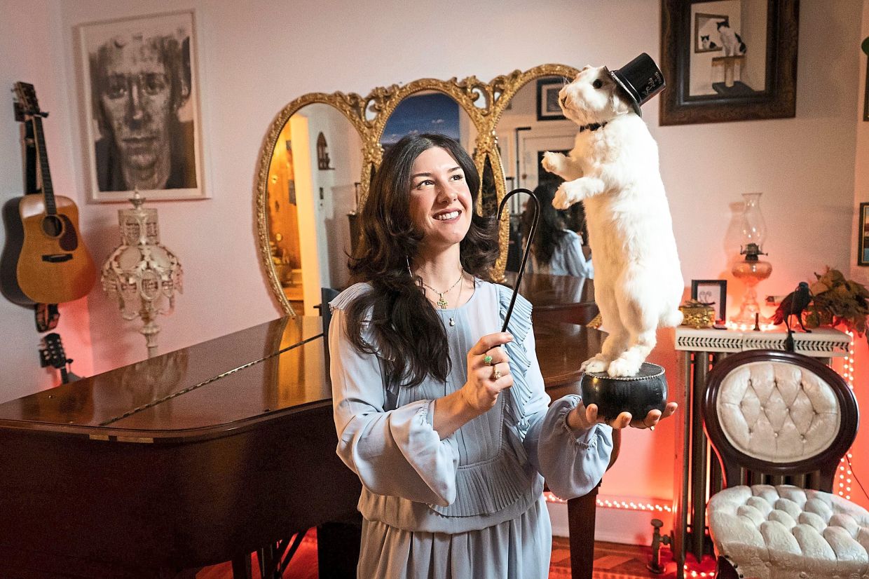 Lindsey Noel, a professional magician, with her preserved pet rabbit, Herman, at her home in Cobbs Creek, Philadelphia, the United States.