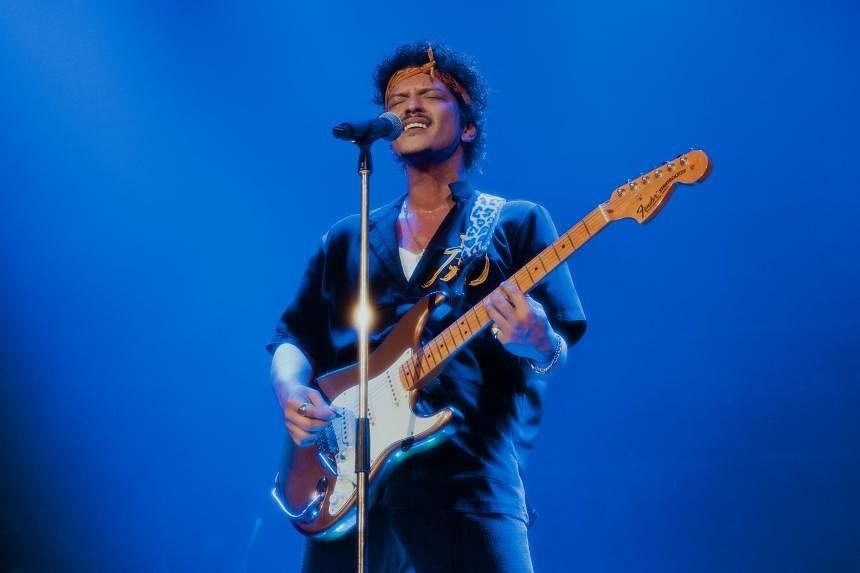 Fans sing along to Singapore National Day Parade song Home at Bruno Mars concert - Vimarsana News